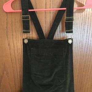 Green corduroy overalls